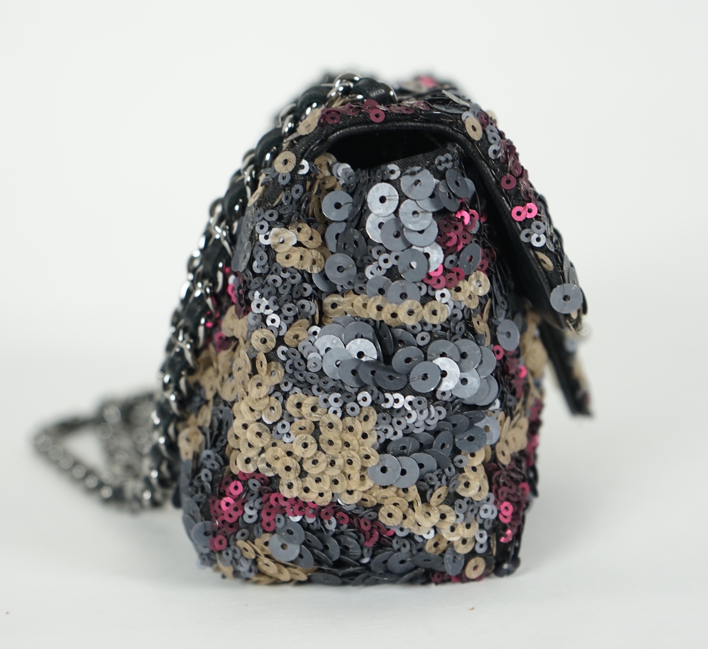 A Chanel 2012 Classique sequined mini shoulder bag, height 11cm, height overall 36cm, width18cm, depth 6.5cm, Please note this lot attracts an additional import tax of 20% on the hammer price